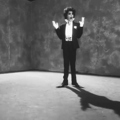 Man In Tuxedo And White Gloves GIF