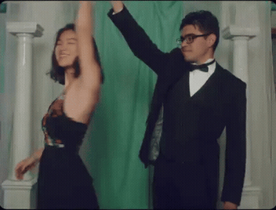 Man In Tuxedo And Woman Dancing GIF