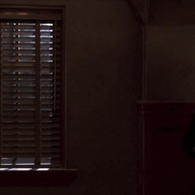 Man In Tuxedo And Woman In Black Dress GIF