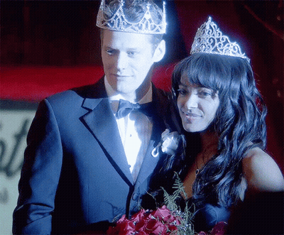 Man In Tuxedo And Woman In Tiara GIF