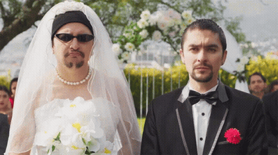 Man In Tuxedo And Woman In Veil GIF