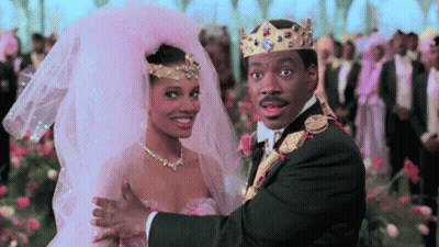Man In Tuxedo And Woman In Wedding Dress Dancing GIF