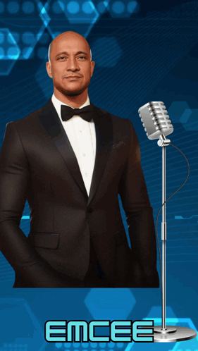 Man In Tuxedo At Microphone Saying Emcee GIF