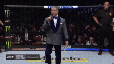 Man In Tuxedo At UFC Cage GIF