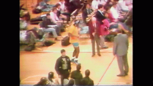 Man In Tuxedo Before Crowd GIF