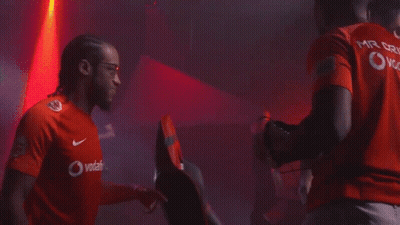 Man In Tuxedo Dancing In Crowd GIF