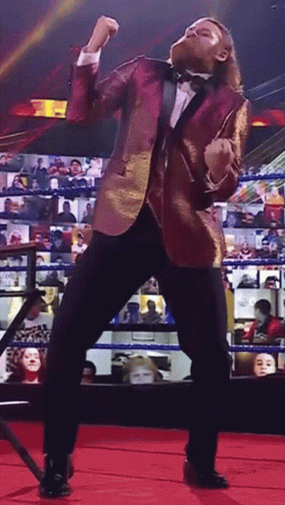 Man In Tuxedo Dancing On Red Carpet GIF
