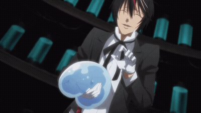 Man In Tuxedo Holding Blue Ball GIF