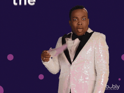 Man In Tuxedo Holding Fan Saying The Shade GIF