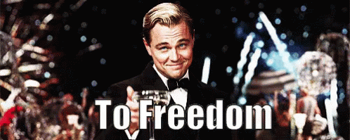 Man In Tuxedo Holding Glass To Freedom GIF