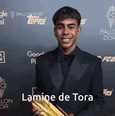 Man In Tuxedo Holding Gold Trophy Lamine De Tora GIF