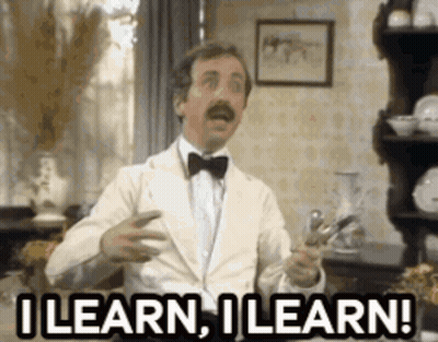 Man In Tuxedo Holding Scissors Saying I Learn I Learn GIF