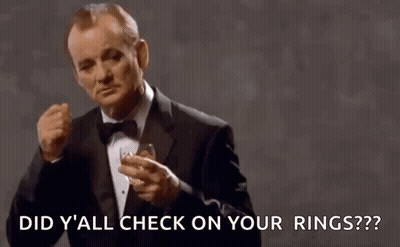 Man In Tuxedo Holding Whiskey Ring A Ding GIF
