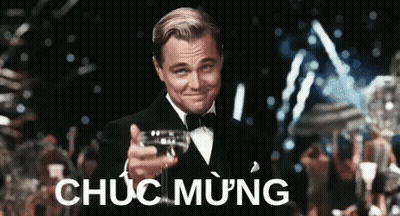 Man In Tuxedo Holding Wine Making Funny Face GIF