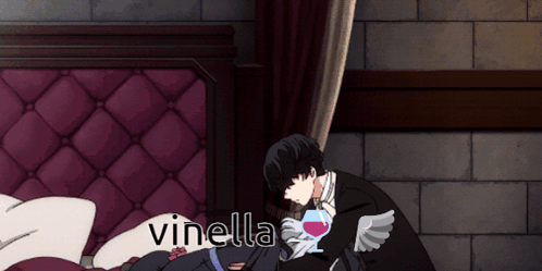 Man In Tuxedo Holding Wine With Vinella GIF
