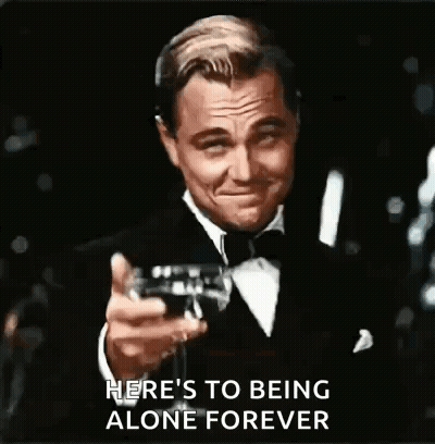 Man In Tuxedo Holding Wine GIF