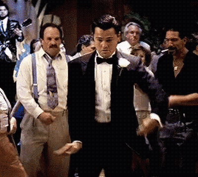 Man In Tuxedo In Front Of Crowd GIF