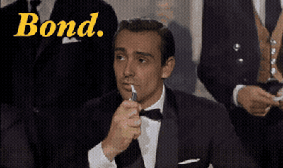 Man In Tuxedo Lighting Cigarette Bond GIF