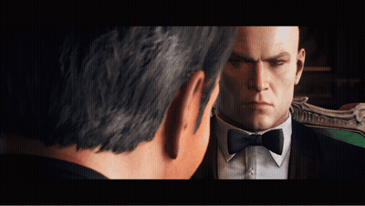 Man In Tuxedo Looking At Another Man GIF