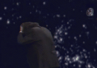 Man In Tuxedo Looking At Camera GIF