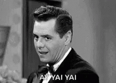Man In Tuxedo Making Funny Face GIF