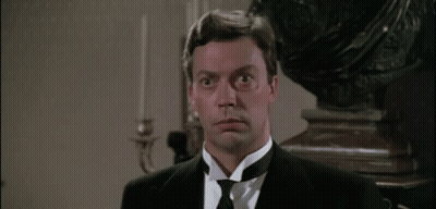 Man In Tuxedo Making Surprised Face GIF