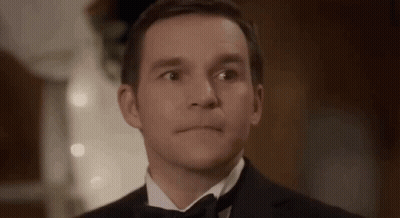 Man In Tuxedo Next To Bride GIF