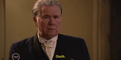 Man In Tuxedo Ouch TNT Ad GIF