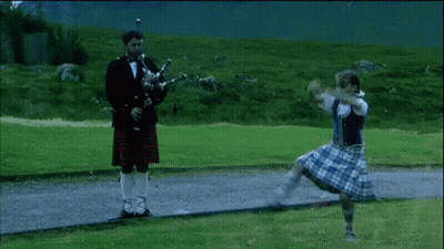 Man In Tuxedo Playing Bagpipe GIF