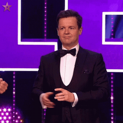 Man In Tuxedo Purple Background GIF