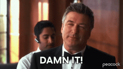 Man In Tuxedo Saying Damn It In Front Of Peacock Logo GIF