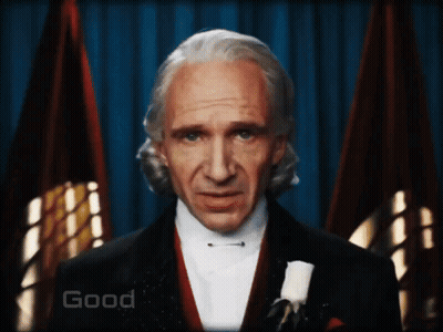 Man In Tuxedo Saying Good GIF