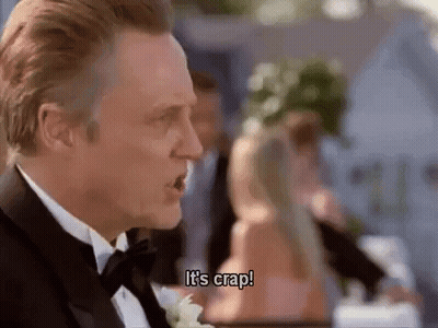Man In Tuxedo Saying It's Crap At Wedding Reception GIF