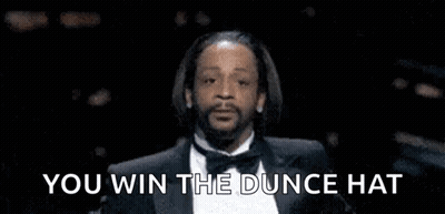 Man In Tuxedo Saying You Win The Dunce Hat GIF