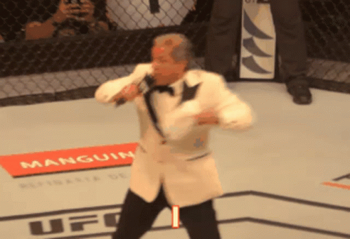 Man In Tuxedo Singing At UFC GIF