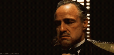 Man In Tuxedo Sitting By Window GIF