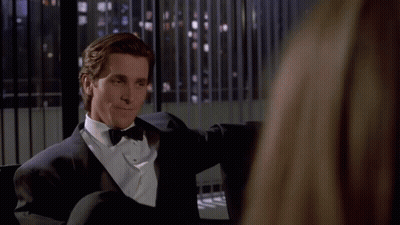 Man In Tuxedo Sitting By Window GIF
