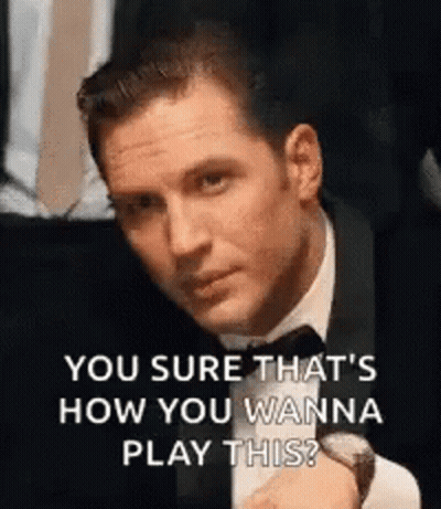 Man In Tuxedo Sitting In Chair GIF
