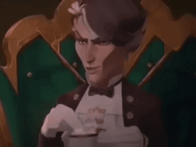 Man In Tuxedo Sitting With Coffee GIF