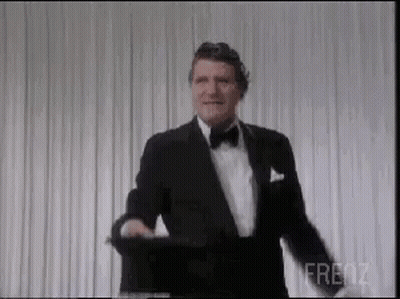 Man In Tuxedo Smiling GIF