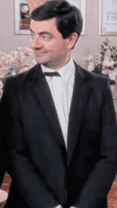 Man In Tuxedo Smiling GIF