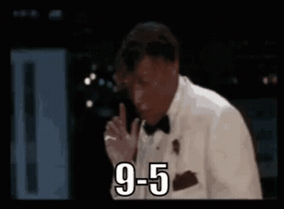 Man In Tuxedo Smoking Cigarette Says 9 To 5 GIF