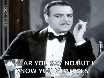Man In Tuxedo Smoking Cigarette GIF