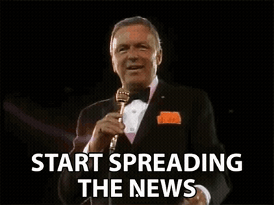 Man In Tuxedo Talking Into Microphone GIF