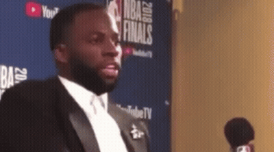 Man In Tuxedo Talking Into Microphone NBA Finals GIF