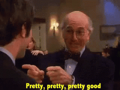 Man In Tuxedo Talking To Another Man GIF