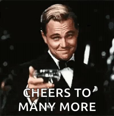 Man In Tuxedo Toasting Champagne GIF