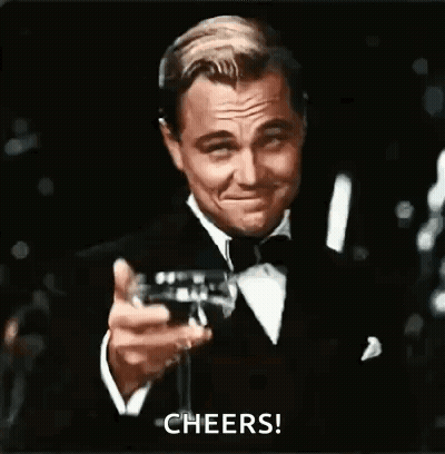 Man In Tuxedo Toasting With Champagne GIF