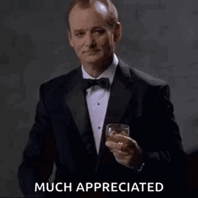 Man In Tuxedo Toasting With Whiskey GIF