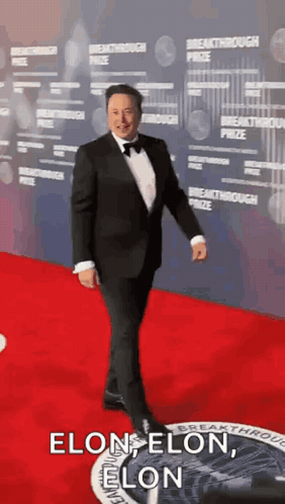 Man In Tuxedo Walking Red Carpet Says Elon Elon Elon GIF